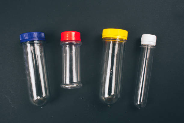 istock Stop plastic pollution. Empty colorful plastic containers on dark background, top view. No to single-use plastic. An evironmental problem, EU directive. Save marine ecology 1142160171