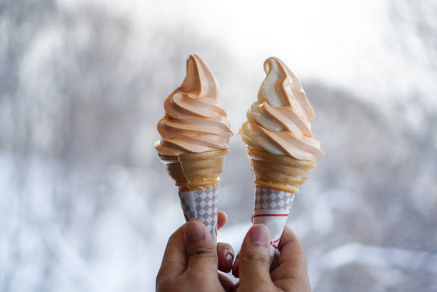 melon and milk ice cream soft serve. - two tone imagens e fotografias de stock