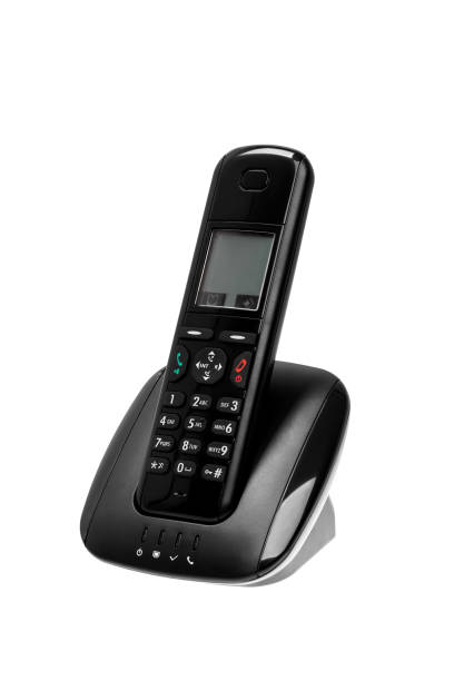 istock Modern black radiotelephone at dock station isolated on white background 1142162501