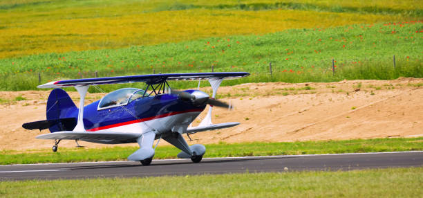 istock Light aircraft landing on aerodrome runway 1142167511