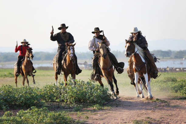 istock People Riding Horses On Field Against Sky 1142172078