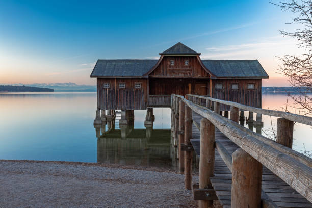 istock Boathouse at lake Ammersee at dawn 1142173387