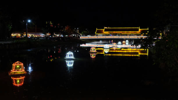 istock bridge over the river lit by night lights, illumination 1142178808