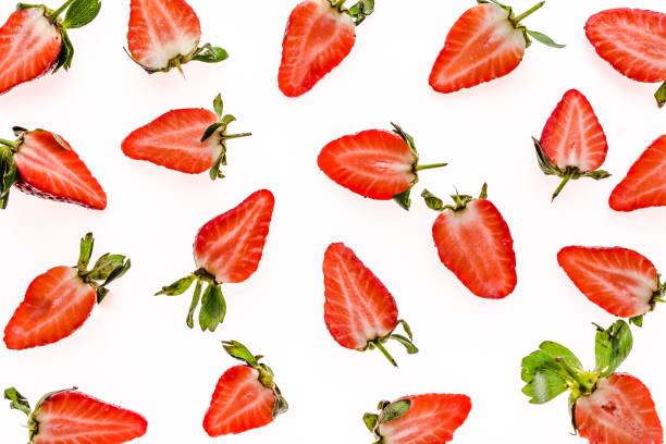 istock Fresh sliced strawberry pattern isolated on white background, clipping path 1142180871