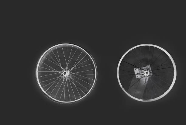 separated bike wheels - uncoordinated imagens e fotografias de stock