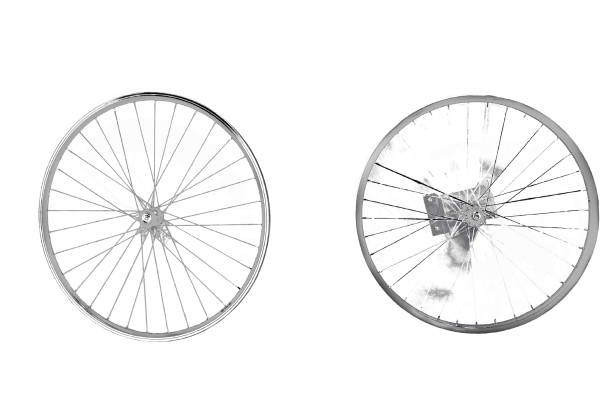 separated bike wheels - uncoordinated imagens e fotografias de stock