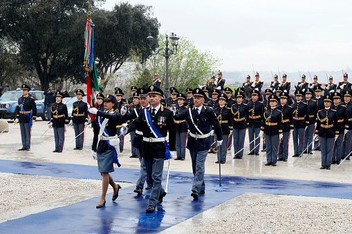 Rome, Italy - April 10, 2019: the police line-up with the Italian flag, during the celebrations of the 167th anniversary of the State Police, held at the Pincio in Rome.