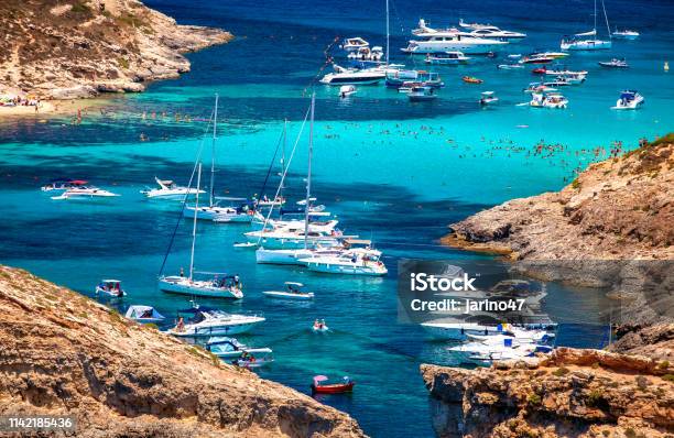 Yachts In Blue Lagoon At Comino Malta Stock Photo - Download Image Now - Malta, Nautical Vessel, Beach