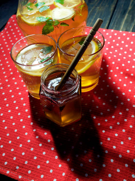 istock Making honey and lemon water 1142185788