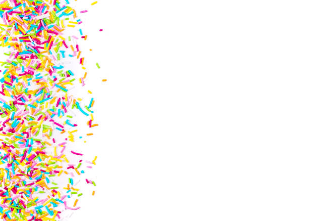 istock Sugar sprinkle dots hearts, decoration for cake and bakery, as a background. Isolated on white 1142186114