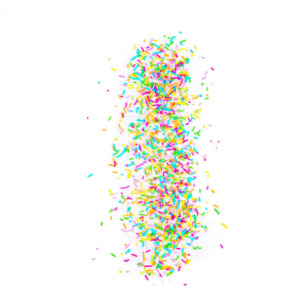 istock Sugar sprinkle dots hearts, decoration for cake and bakery, as a background. Isolated on white 1142186848