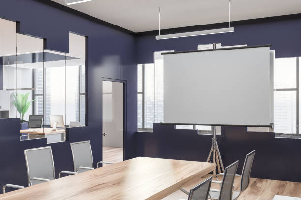 istock Blue and glass meeting room corner with poster 1142187638