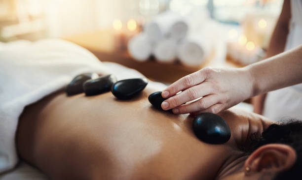 istock Hot stone massage therapy melts away tension 1142187726