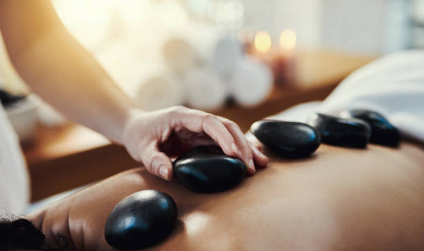 istock Hot stone massage are a helpful way to ease muscle tension 1142187728