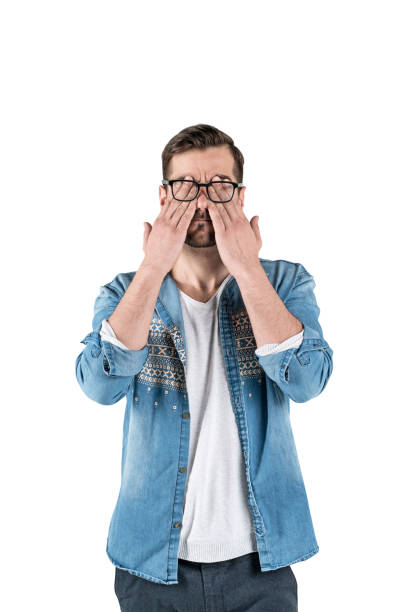 istock Casual man covering eyes with hands, isolated 1142188508