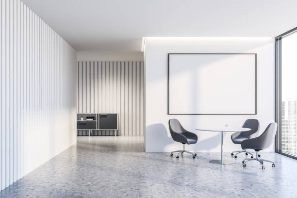 istock White office waiting room with cabinet and poster 1142189181