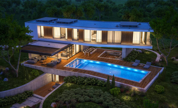 istock 3d rendering of modern house on the hill with pool in night 1142190988
