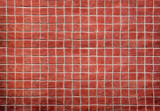 istock Old red square brick mosaic tiles texture background. Brick tiles wall. 1142192263