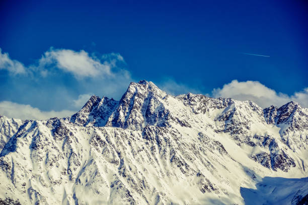 istock Austrian alps covered with snow during sunny winter day. 1142193711