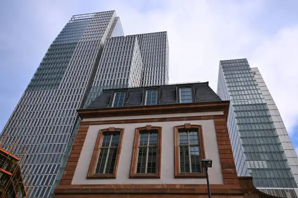 Frankfurt, Germany, 01/08/2016: Old house and new skyscrapers in downtown