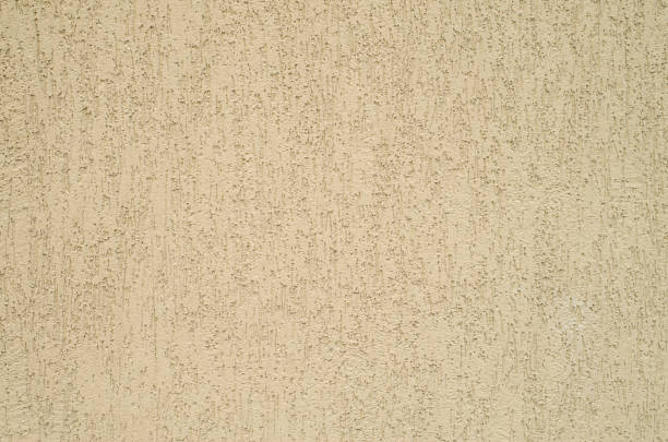 istock New yellow relief plaster on wall closeup 1142198191