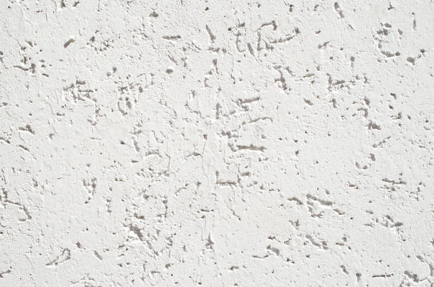 istock New white relief plaster on wall closeup 1142198792