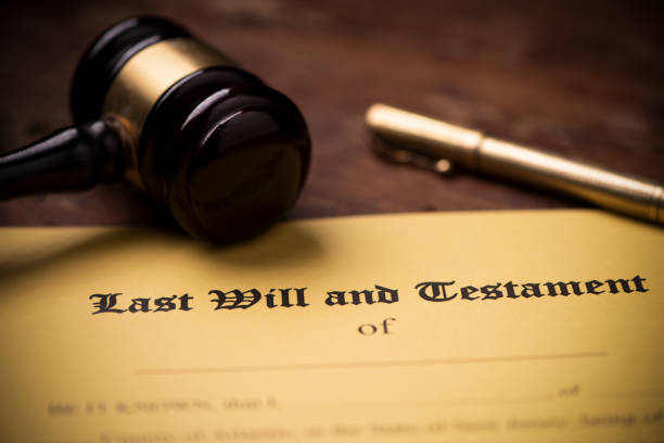 istock Last will and testament form with gavel. Decision, financial 1142199430
