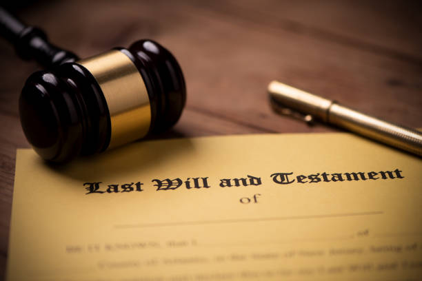 istock Last will and testament form with gavel. Decision, financial 1142199454