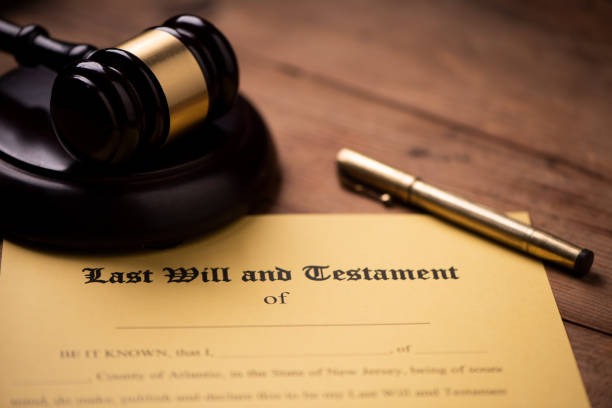istock Last will and testament form with gavel. Decision, financial 1142199486