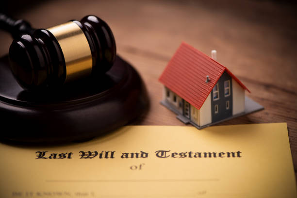 istock Last will and testament form with gavel. Decision, financial 1142199513