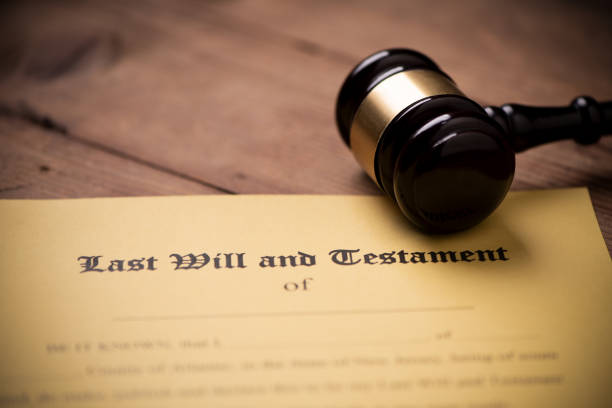 istock Last will and testament form with gavel. Decision, financial 1142200355