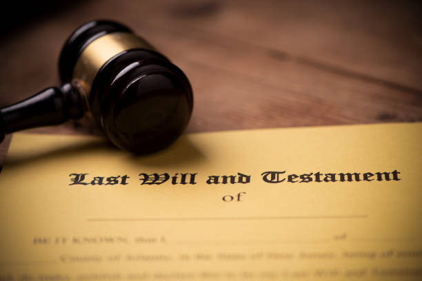 istock Last will and testament form with gavel. Decision, financial 1142200470
