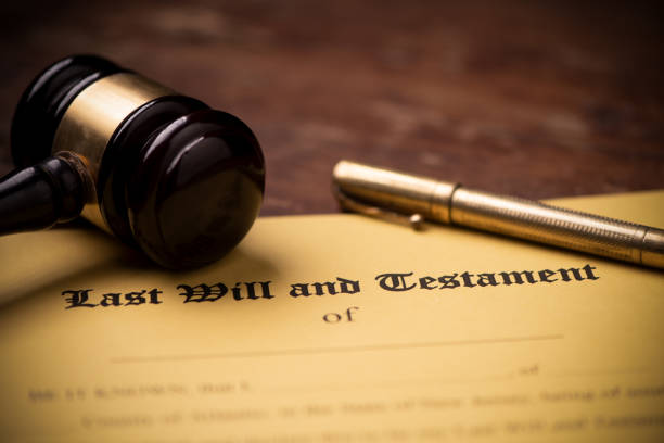 istock Last will and testament form with gavel. Decision, financial 1142200499