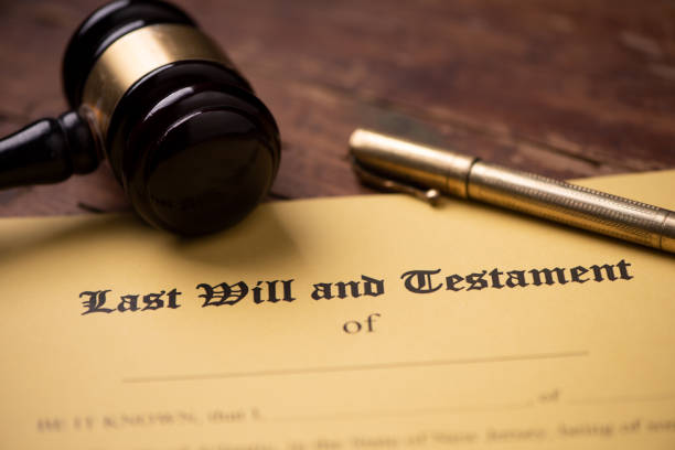 istock Last will and testament form with gavel. Decision, financial 1142200514