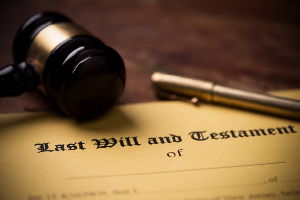 istock Last will and testament form with gavel. Decision, financial 1142200546