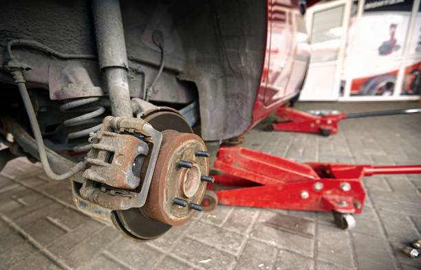 istock Replacing the wheels on a car on the service. 1142200775