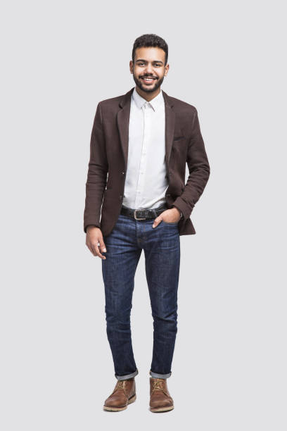 istock Full length portrait of handsome smiling young man 1142202045