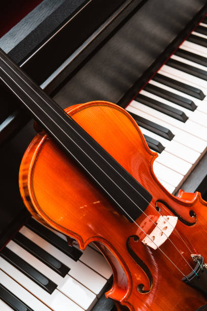 istock Violin and piano. Classical music. 1142202239