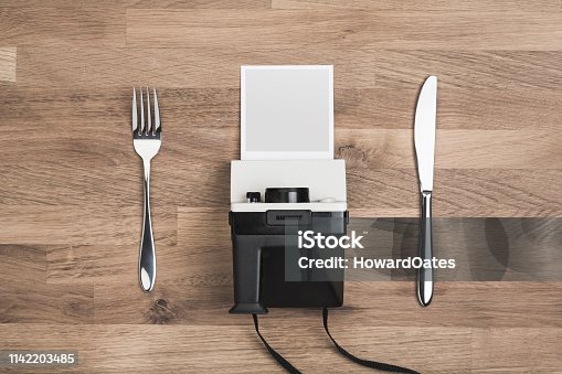istock Food photography concept with vintage polaroid camera 1142203485