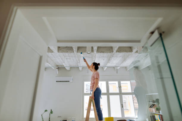 istock Painting interior of future creative, business studio 1142206260