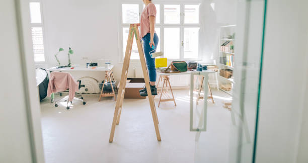 istock Painting interior of future creative, business studio 1142206264