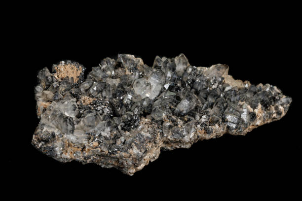 istock Macro stone mineral Quartz with ilvayit on a black background 1142206356