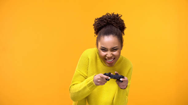 istock Excited teenager playing video game by console, modern technology, entertainment 1142209442