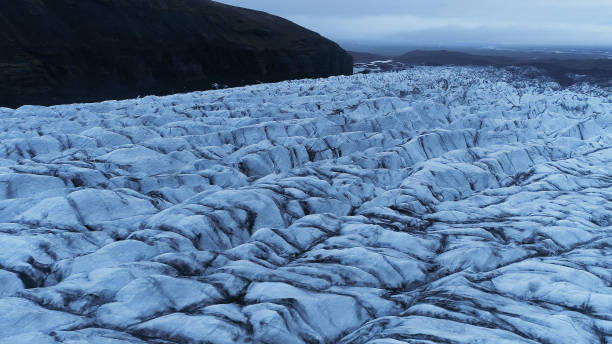 istock Glacier tongue with cracks. Aerial view 1142209718