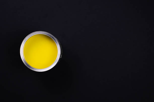 istock Bank with yellow paint on a black background. 1142212681