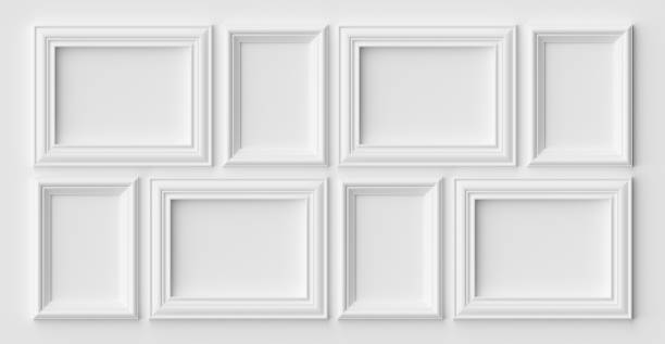 istock White photo or picture frames on the white wall with shadows 1142213069