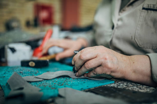 istock Woman making shoe 1142213518