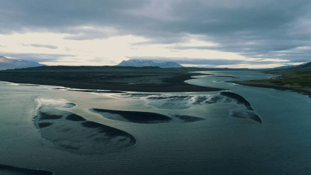istock Icelandic coastline. Black, rocky beach. Aerial view 1142214724