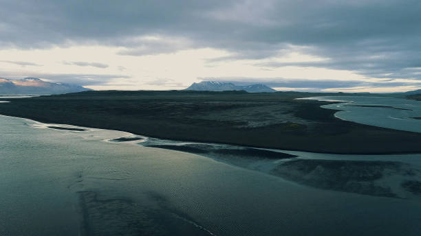 istock Icelandic coastline. Black, rocky beach. Aerial view 1142214727