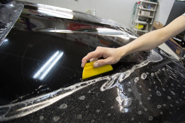 istock car paint protection film installing 1142216896